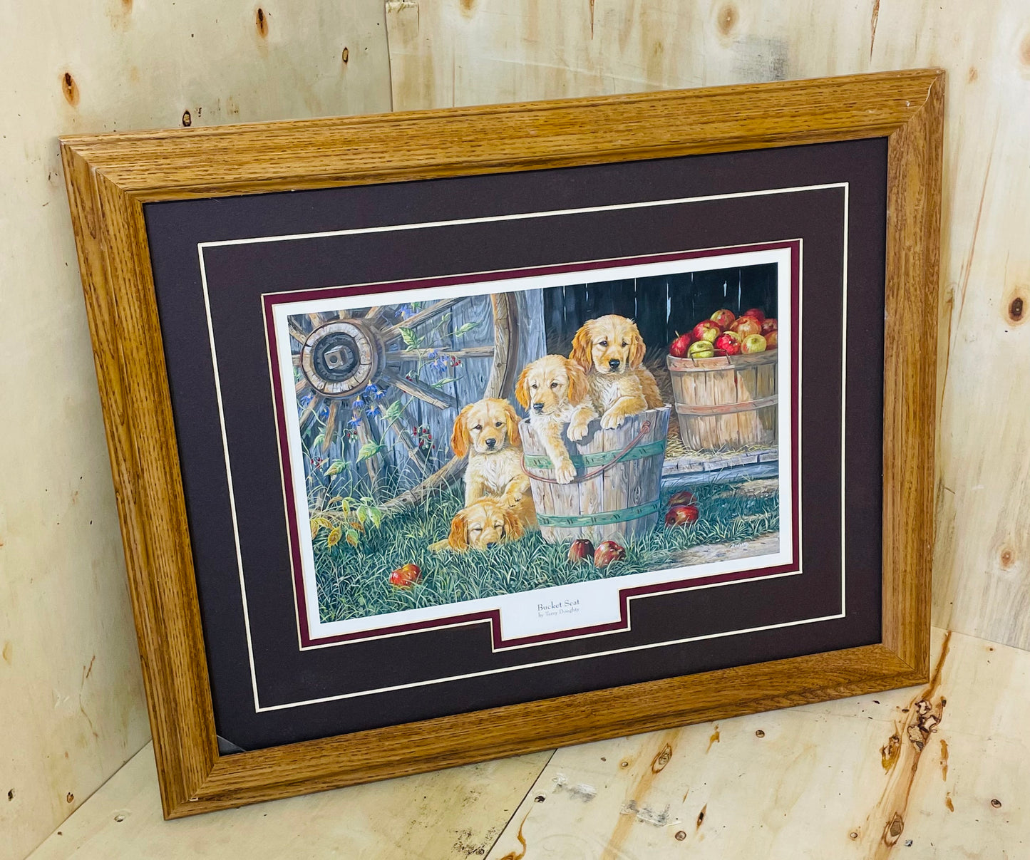 “Bucket Seat” Framed Art Print – Puppies in Apple Buckets